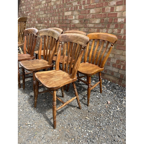 21 - A set of six country pine windsor style chairs