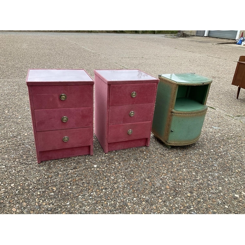 212 - A pair of pink upholstered three drawer bedsides together with a green loom style bedside