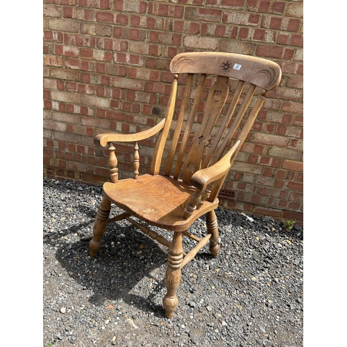 22 - A Windsor carver chair