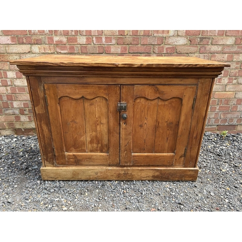 24 - A pine two door larder cupboard / sideboard   124x55x76