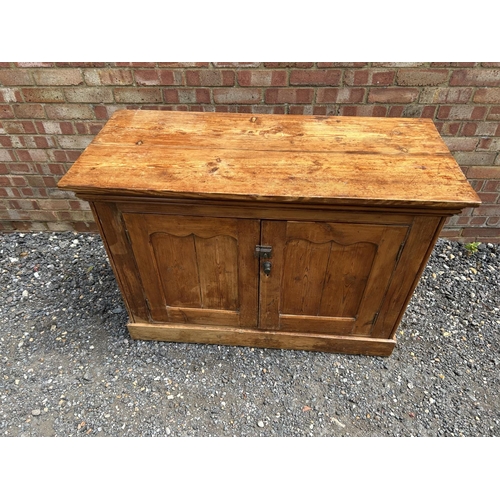 24 - A pine two door larder cupboard / sideboard   124x55x76