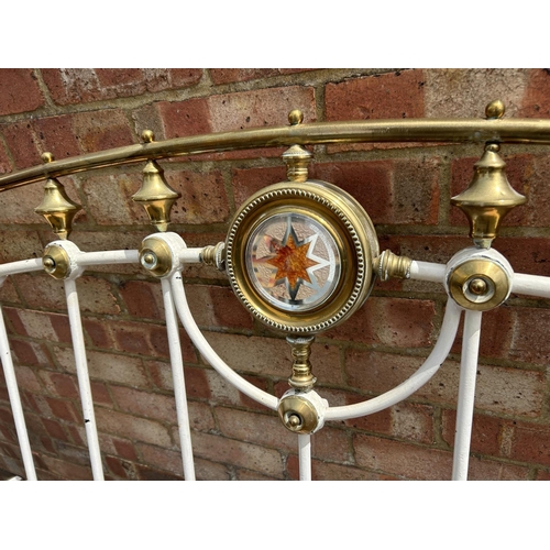 26 - A Victorian iron and brass double bed frame