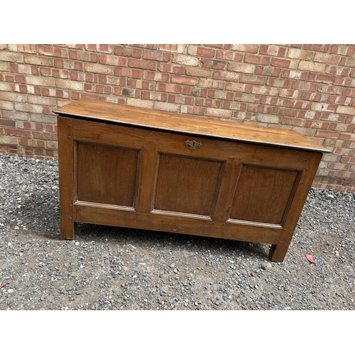 32 - An antique oak three panel blanket box 140x50x72