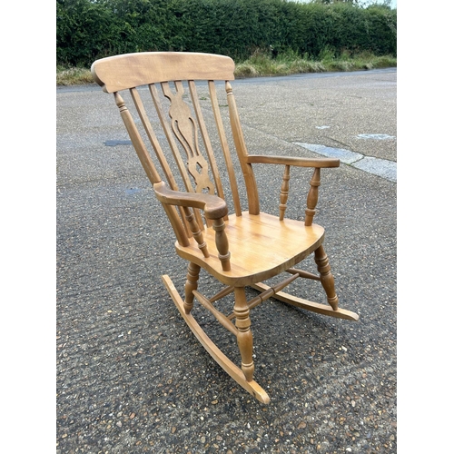 354 - A country pine rocking chair