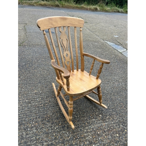 354 - A country pine rocking chair