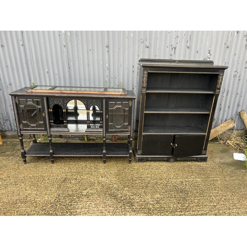 356 - An ebonised sideboard together with matching bookcase