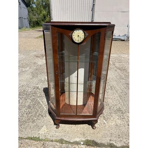 361 - A deco style cabinet with clock