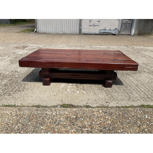 366 - A very large thick hardwood coffee table crafted from railway sleepers 155x90x 45