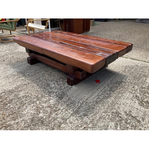 366 - A very large thick hardwood coffee table crafted from railway sleepers 155x90x 45