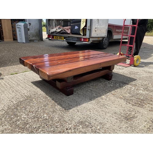 366 - A very large thick hardwood coffee table crafted from railway sleepers 155x90x 45