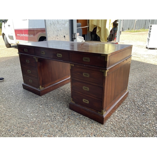 367 - A reproduction mahogany military style desk with brass inlaid top 153x77x77