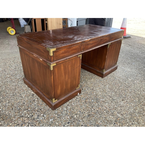 367 - A reproduction mahogany military style desk with brass inlaid top 153x77x77