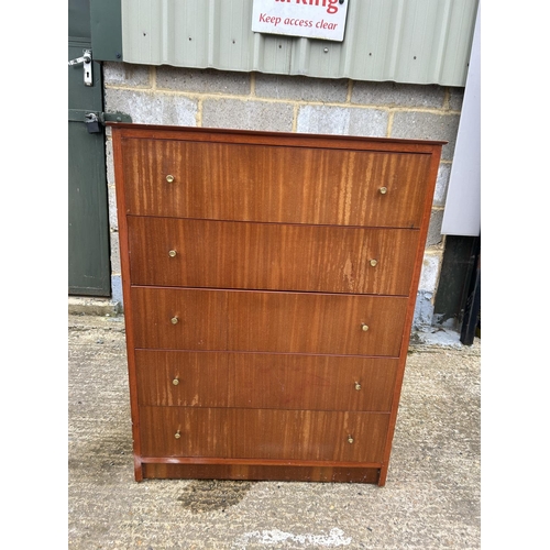 39 - A teak tallboy chest of five drawers 77x44x100