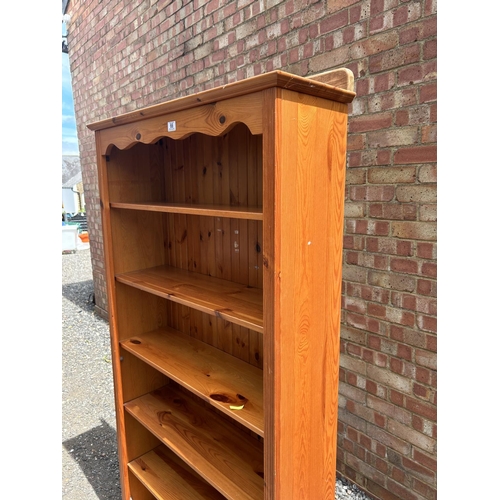 66 - A pine opem fronted bookcase 91x30x185