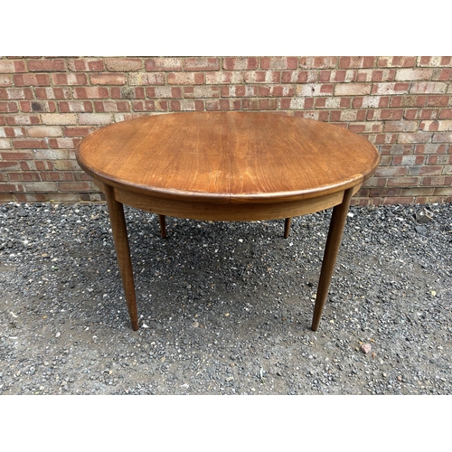 67 - A g plan teak circular dining table 120cm round