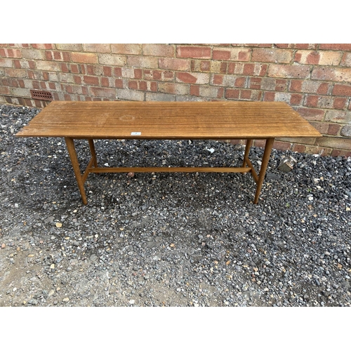 7 - Teak coffee table 122x41 x40