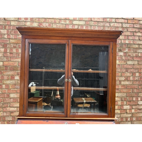 71 - A Victorian mahogany bureau bookcase fitted to the interior 122x50x210