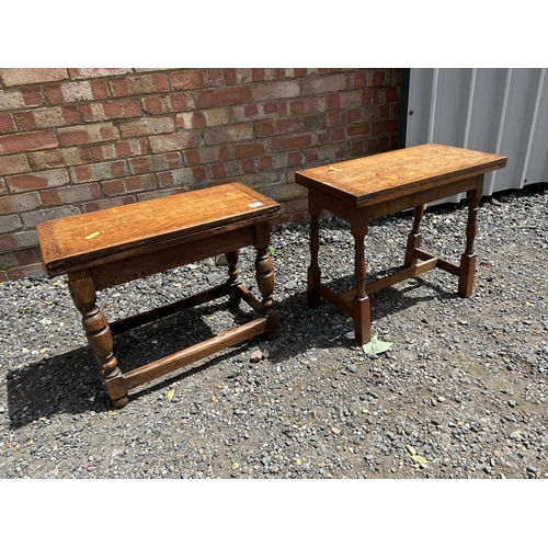 73 - Two oak occasional tables with twist and flip over tops