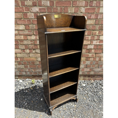 74 - A slim oak bookcase 47x26x127