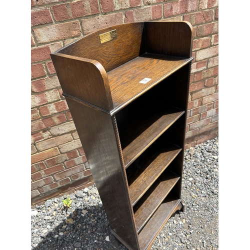 74 - A slim oak bookcase 47x26x127