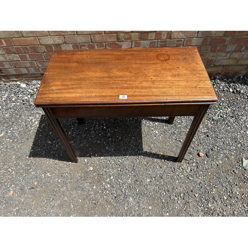 75 - A Georgian mahogany fold over tea table