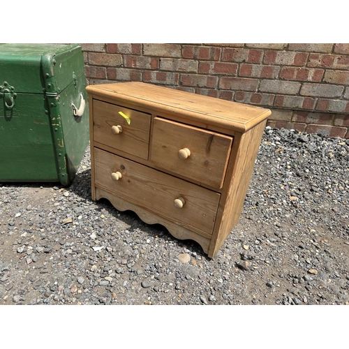 81 - A pine chest of three together with a green painted trunk