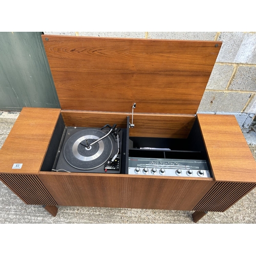 83 - A teak cased radiogram 120x 42 x66