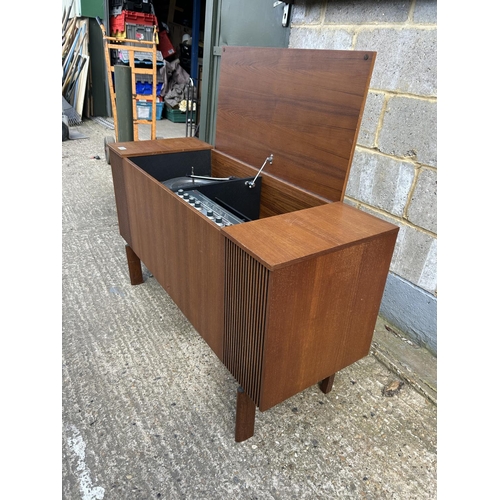 83 - A teak cased radiogram 120x 42 x66