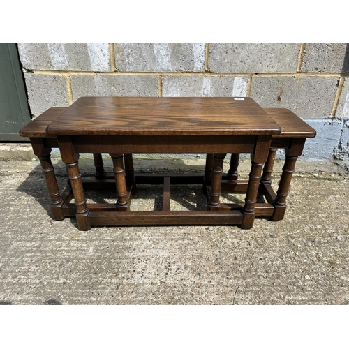 93 - A webber oak nest of three tables