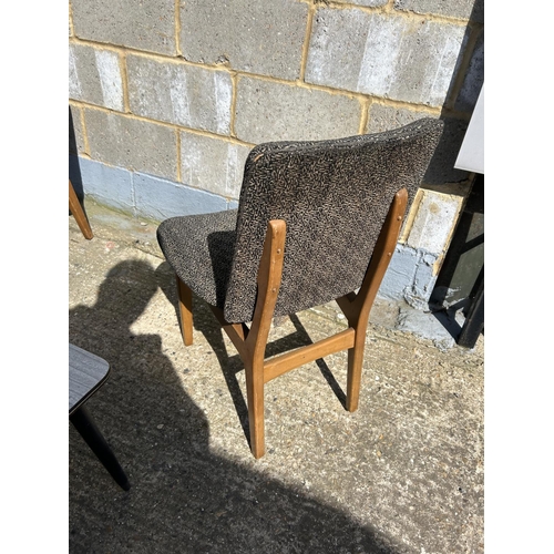 96 - A retro coffee table and two chairs