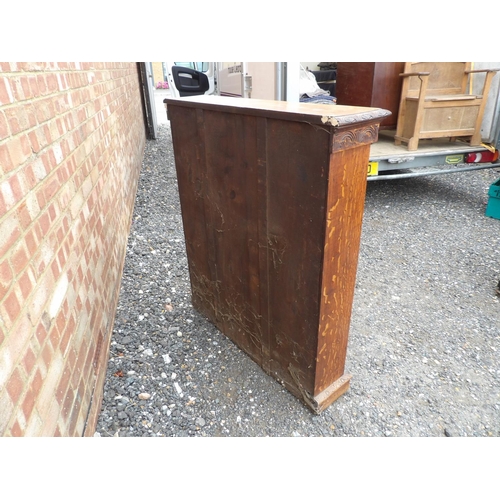 1 - A carved oak open fronted bookcase with three open shelves 104x23x118