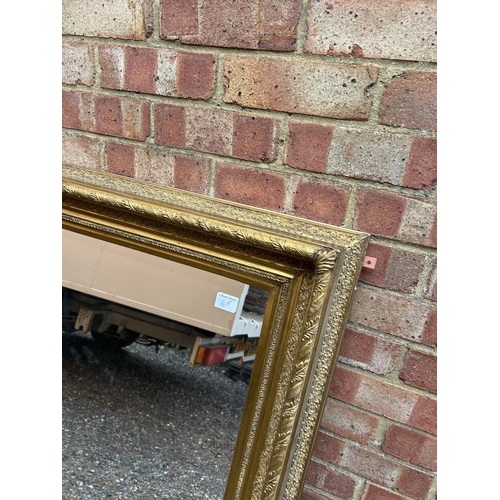 100f - A very large heavy gold gilt framed mirror 100x125