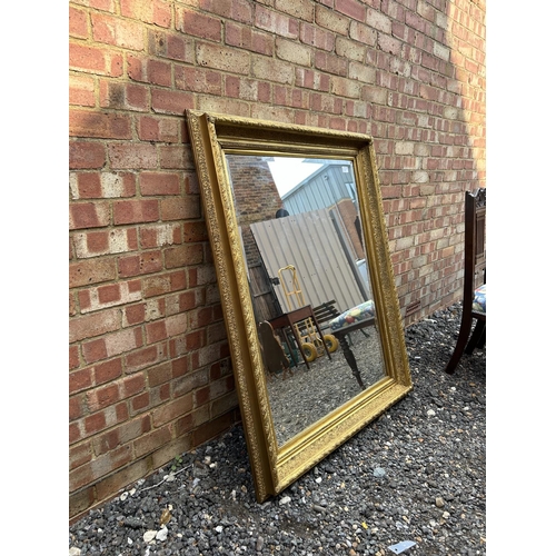 100f - A very large heavy gold gilt framed mirror 100x125