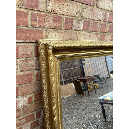 100f - A very large heavy gold gilt framed mirror 100x125