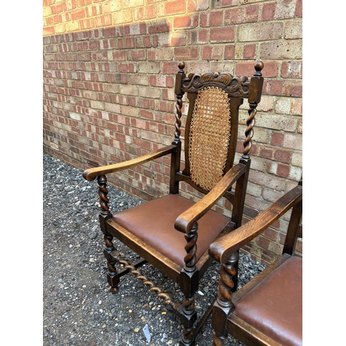 100l - A pair of oak barley twist carver chairs