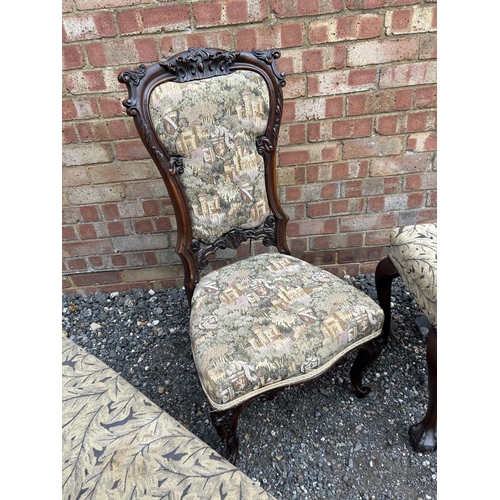 100p - An ornate mahogany chair, ball and claw stool and a modern footstool