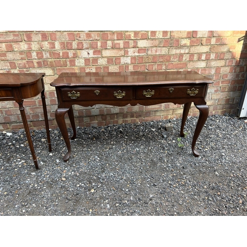 100q - Two reproduction mahogany hall tables together with a reproduction mahogany folding campaign table