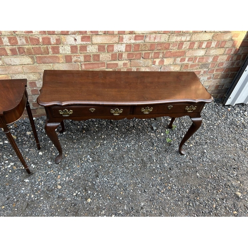 100q - Two reproduction mahogany hall tables together with a reproduction mahogany folding campaign table