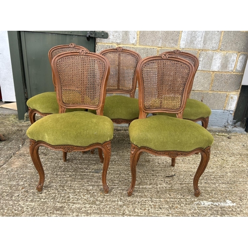 107 - A set of five French dining chairs