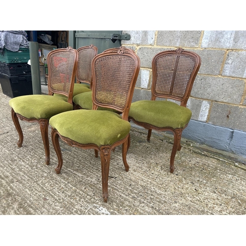 107 - A set of five French dining chairs