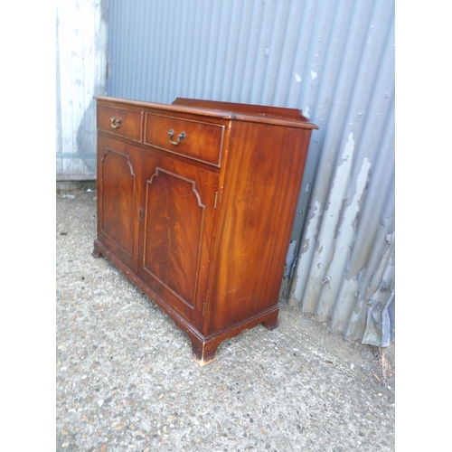 113 - Repro mahogany two drawer sideboard