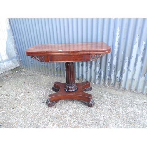 114 - A victorian mahohany fold over card table with green baize surface