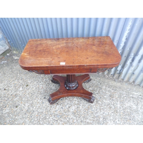 114 - A victorian mahohany fold over card table with green baize surface