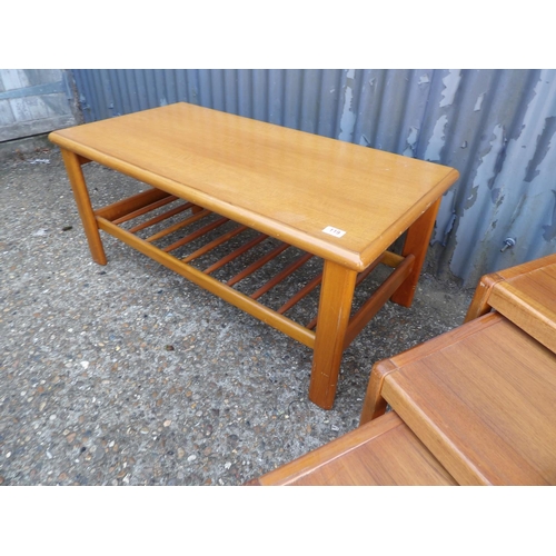 119 - A teak nest of three and a teak coffee table