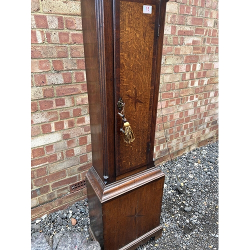 15 - An oak cased longcase clock with brass dial by JOHN MURCH of Honiton