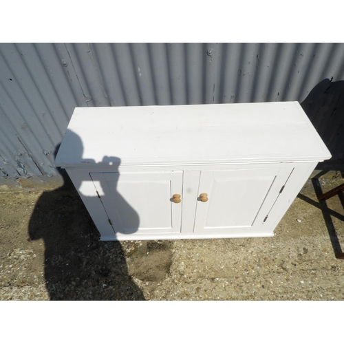 150 - A white painted pine two door cupboard