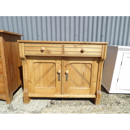 151 - A french pine two drawer sideboard