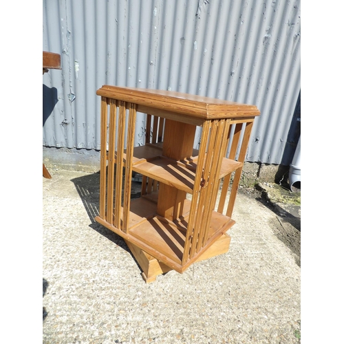 153 - A country pine revolving bookcase