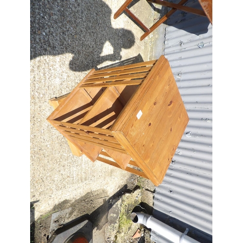 153 - A country pine revolving bookcase