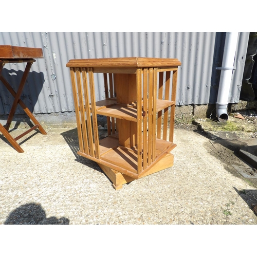 153 - A country pine revolving bookcase